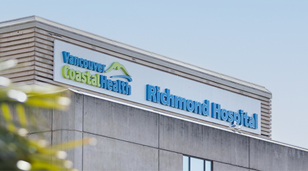 Close-up of the Richmond Hospital sign on the front of the building