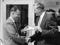 R.C. Talmey with Hon. Leslie Peterson, 1957.