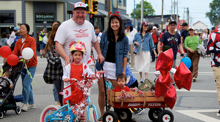 Family attending Canada Day parade in Steveston.