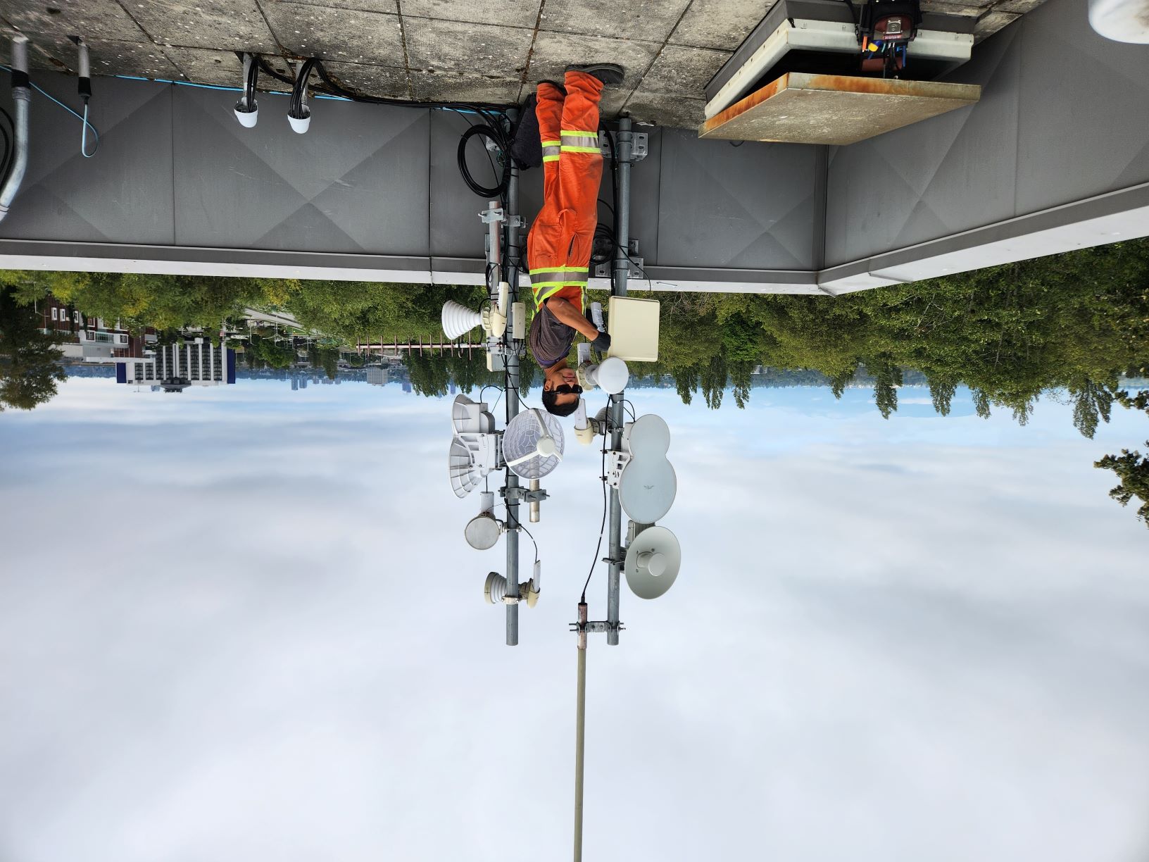 City worker with radio tower