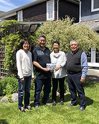 A photo of the project team and their Heritage Award.