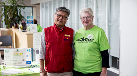 Two seniors at 55+ Activate Wellness Fair at Minoru Centre for Active Living