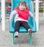 child on slide