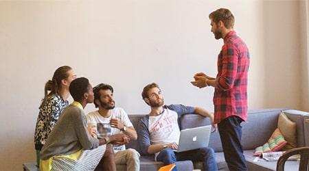 Group of young people having a discussion.