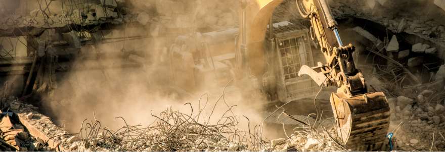 View of a townhouse complex being demolished