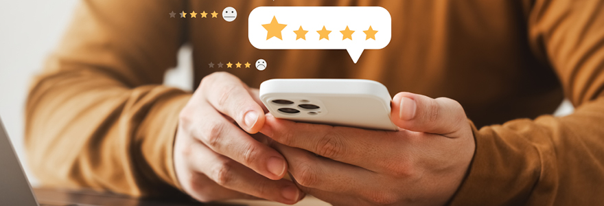 A person holding a mobile device to provide feedback