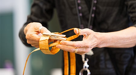 Traditional cedar bracelet weaving