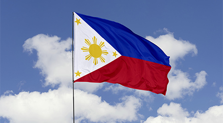 Philippine flag waving in remembrance and solidarity