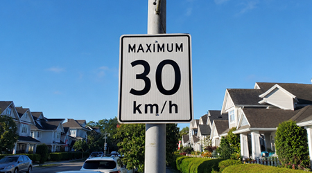 Image of a 30km/hr speed limit sign