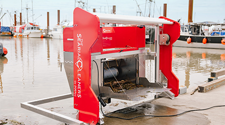 New river trash skimmer on Fisherman’s Wharf in Steveston