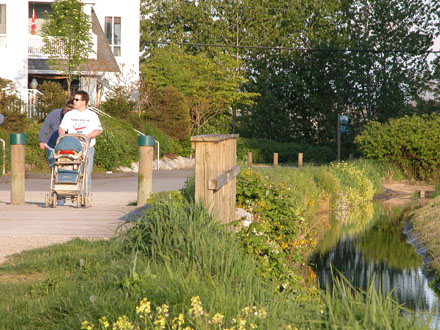 Great West Cannery Park - east facing view towards linear park entrance and trail